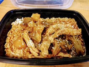 Sesame ginger garden chicken with rice, broccoli and pineapple at Fired On The Mountain Cafe in Lincoln