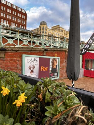 Tucked into pedestrian ramp next to sailing club  at Ice Cafe in Brighton