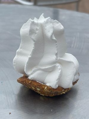 Dog Whippy; a hand baked protein biscuit with a blob of Whippy for your canine companion. at Ice Cafe in Brighton