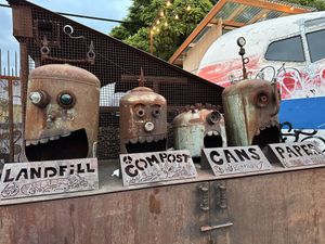Amazing art and disposal station !!   at Hawthorne Asylum Food Truck Pod in Portland