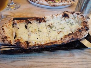 Garlic rosemary cheesy strips (vegan) at Slow Rise Pizza in Lincoln