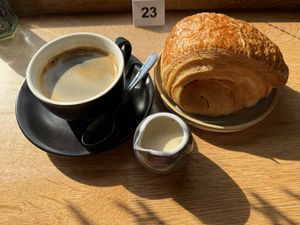 Americano + oat milk (extra charge), vegan pain au chocolat 👌🏻  at Stir - Chesterton in Cambridge