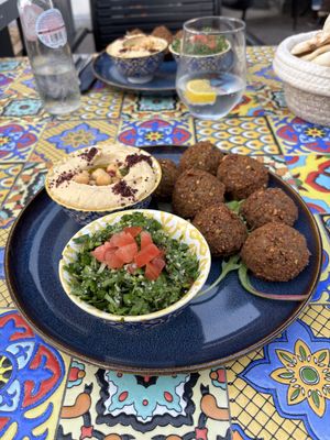 Falafel with Tabouleh and Hummus  at Shakshuka Restaurant and Bar in The Hague