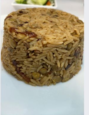 Gluten & Vegan
A delicious Middle Eastern rice, lentils & onions entree, served with a side salad
 at Boon Cafe in Norridge