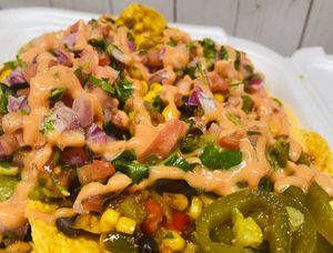 Vegan & Gluten Free loaded nachos
[in house made cheese sauce] at Boon Cafe in Norridge