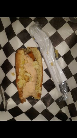 Who woulda thunk... crushed pineapple and potato chips atop a dawg could be so yummy! at Mike's Vegan Grill in Greensboro