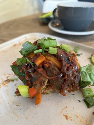 A half eaten vegan and hummus on toast  at Olive in Thurso