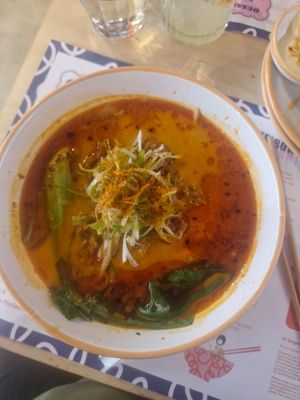 Spicy Miso Tantanmen: Shiitake dashi, spicy sesame & miso tare, Sapporo noodles, plant-based spiced mince, pak choi, spring onion, crunchy chilli oil at House of Fu in Leeds