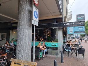 On the corner, outdoor seating at MAMS in Arnhem