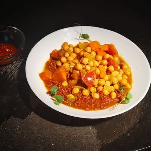 Chickpea ragout with homemade harissa & red rice at Verv Kitchen in Bucharest