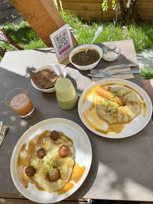 Beyond Meat Balls and Sausage with mashed potatoes and onion soup  at Verv Kitchen in Bucharest