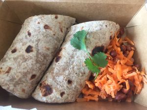 Rolex: a wholewheat chapati with a chickpea omelette with caramelised veggies, herbs and mayo or chutney. at Love and Karma in Midrand