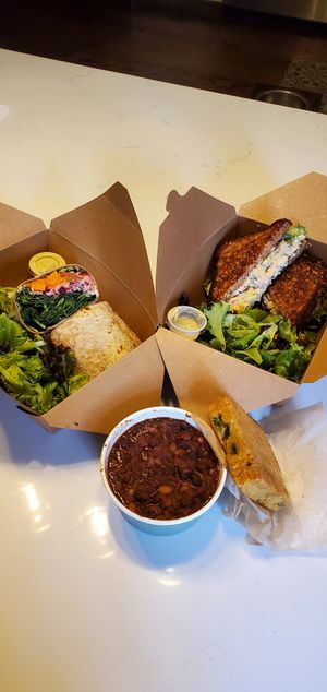 Quinoa salad wrap, tuna chickpea sandwich, chili combo w/ GF jalapeño corn bread at Wildflour Vegan Bakery and Juice Bar in Pawtucket
