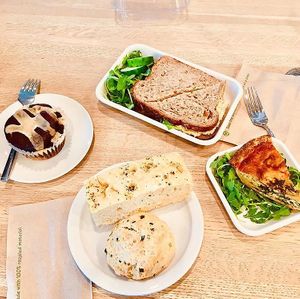 Chickpea ‘Tuna’ Sandwich, Quiche made with Just Egg, a Sour Cream & Chive Scone, Focaccia, and a Peanut Butter and Chocolate Muffin.  at Wildflour Vegan Bakery and Juice Bar in Pawtucket