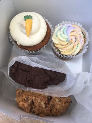 Carrot cake cupcake, pride cupcake, award winning cookies at Wildflour Vegan Bakery and Juice Bar in Pawtucket