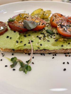 Yummy avocado & tomato toast! at Yum Baaar in Segovia
