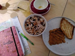 Breakfast bowl, finished café y zumo and croissant 🥐 from toaster..plus extra espresso costed 16 euro. at Yum Baaar in Segovia
