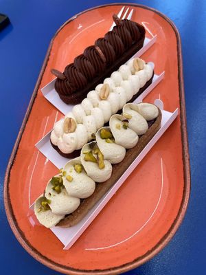 Pistachio/cherry, banana/caramel and chocolate/plum vegan eclairs #Veganuary at Eklerownia in Gdansk