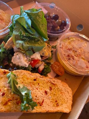 Foccacia platter with salad, olives sun fried tomatoes homemade hummus , coleslaw and potato salad. Balsamic and olive oil dip ❤️ at The Bay Vegan Deli Coffee House in Sandown