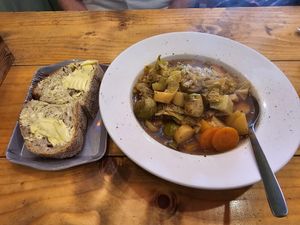 Homemade stew and crusty bread at The Bay Vegan Deli Coffee House in Sandown