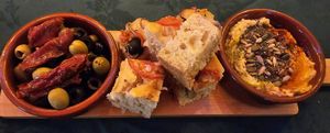 Olives, foccacia and hummus at The Bay Vegan Deli Coffee House in Sandown