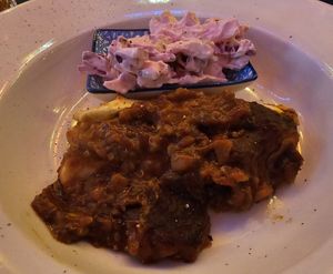 Stuffed sweetheart cabbage parcels in rich tomato sauce at The Bay Vegan Deli Coffee House in Sandown