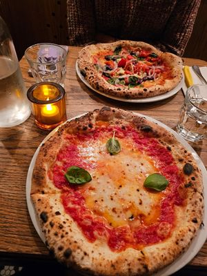 Very good pizza, especially the crust. Knowledge and friendly staff. Pictured is the vegan margherita and the vegan grilled vegetable. Subbing vegan cheese (fauxmage) was free. at Pizzéria No 900  in Montreal