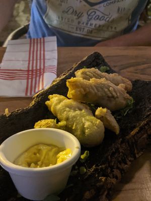 Fried zucchini flowers at night at La Favouille in Le Lavandou