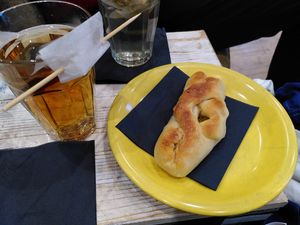 Pastry filled with vegetables and black tea at Gottfried's Feinkiosk im Leibnizhaus in Hannover