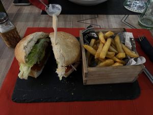 Vegan plant based burger with avocado and fries  at Los Andes in Santa Pola