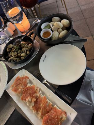 Tomato bread, Canarian potatoes, garlic mushrooms   at Maná 264 in Gran Canaria