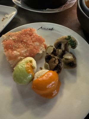 Tomato bread, garlic mushrooms and Canarian potatoes   at Maná 264 in Gran Canaria