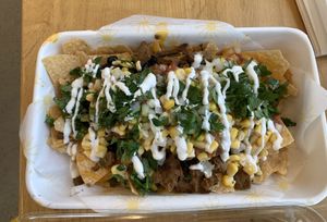 Nachos topped with vegan carne asada at Plantos in Riverside