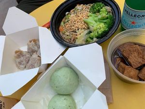 Hot noodles with peanuts & sesame, braised tofu, veggie bao, sticky rice dumplings. at Yaso in New York City