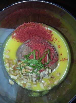 Carob mousse with pineapple, coconut cream and nuts
 at Cor de Tangerina in Guimaraes
