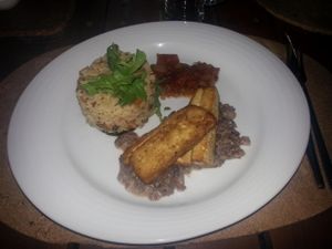 Rosemary rice with vegetables, smoked tofu, confit tomato   at Cor de Tangerina in Guimaraes