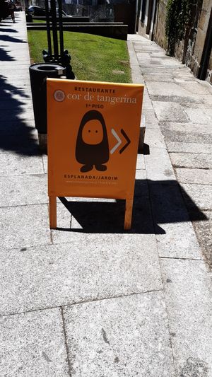 Restaurant's sign at Cor de Tangerina in Guimaraes