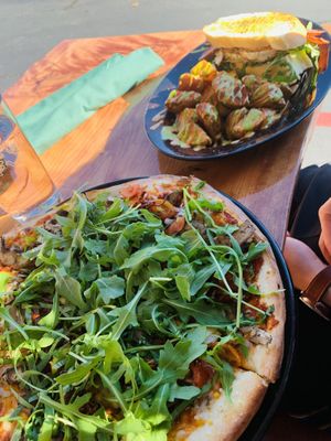 Fried egg sandwich and vegan Rita pizza at Julia's Vegetarian Restaurant in Pacific Grove