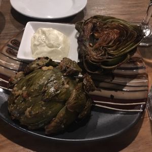 garlic roasted artichoke with vegan dipping sauce  at Julia's Vegetarian Restaurant in Pacific Grove