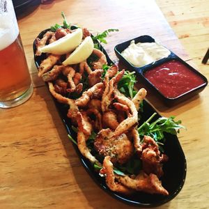 Fried mushroom “calamari” with cocktail sauce and vegan garlic aioli  at Julia's Vegetarian Restaurant in Pacific Grove