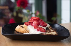 Vegan french toast with candy cap caramel sauce and organic P&K strawberries at Julia's Vegetarian Restaurant in Pacific Grove