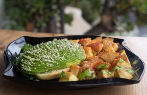 Avocado toast with crispy breakfast potatoes at Julia's Vegetarian Restaurant in Pacific Grove