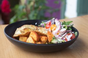 Brunch bowl with your choice of vegan eggs or regular eggs at Julia's Vegetarian Restaurant in Pacific Grove