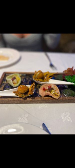 Complimentary amuse-bouche but confusion over if/what was gluten free and then were informed the GF items were touching non gluten at Turmeric Gold in Coventry