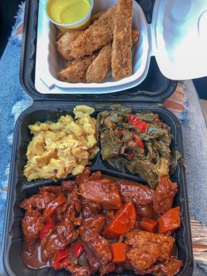 Special plate. Mac and cheese, ribs, collard greens and the chickun tenders with honey mustard  at The Land of Kush in Baltimore