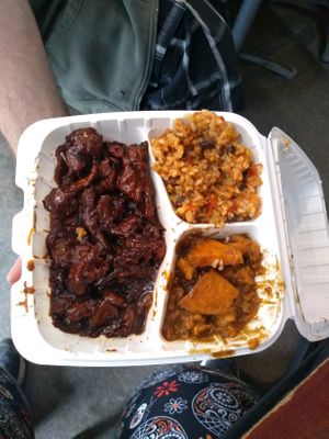 Vegan Ribs, Jolief rice, and sweet potatoes. at The Land of Kush in Baltimore
