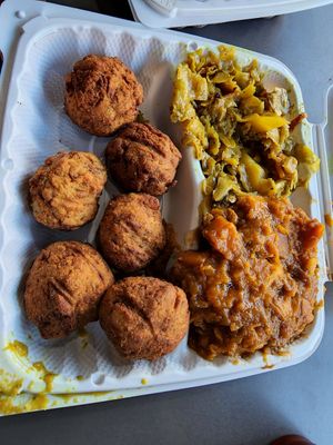 Black-eye pea fritters, curried cabbage, and yams at The Land of Kush in Baltimore