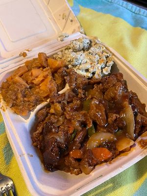 Ribs, yams and Mac n cheese  at The Land of Kush in Baltimore