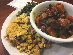 BBQ ribs, mac 'n cheese, and collard greens at The Land of Kush in Baltimore