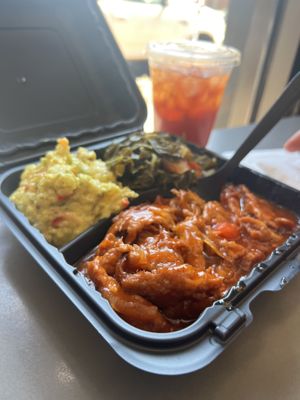 BBQ ribs, potato salad, collard greens & sweet teaa  at The Land of Kush in Baltimore